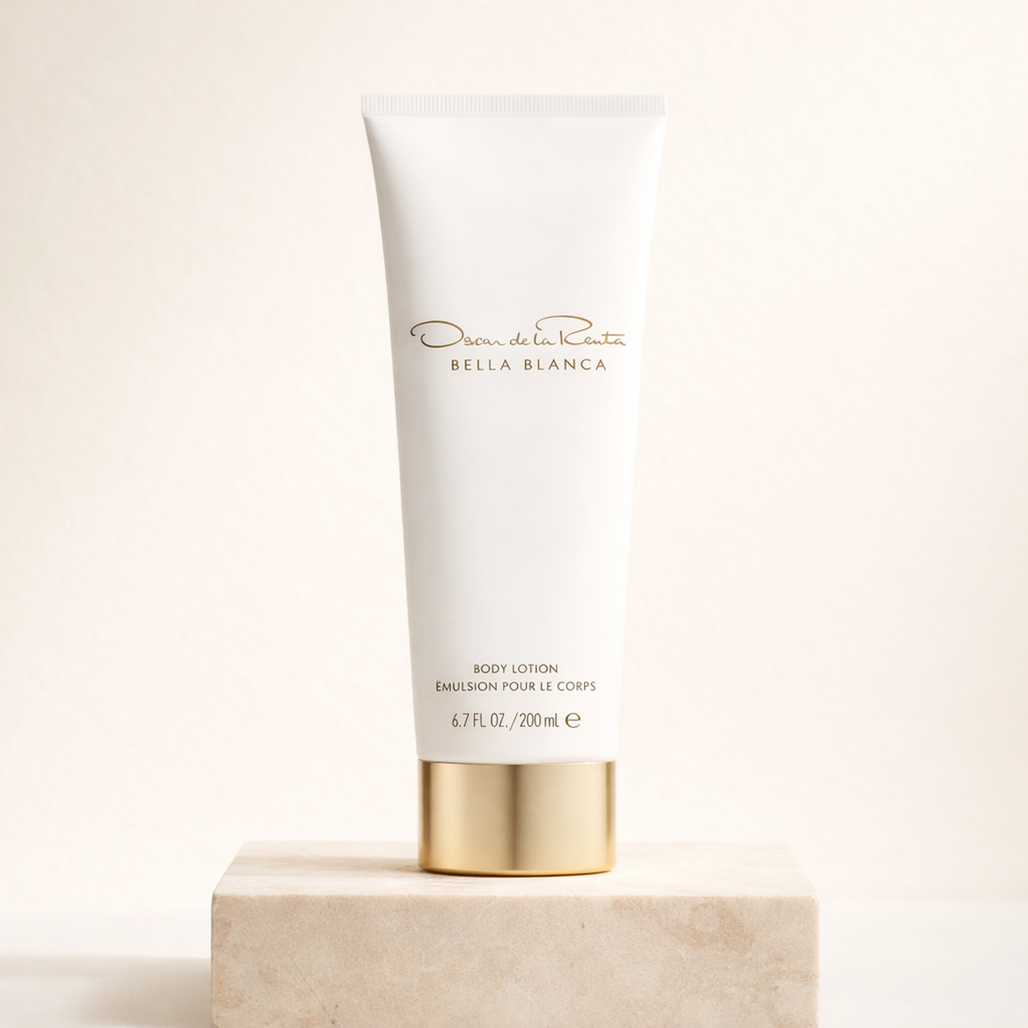 Oscar De La Renta Bella Blanca Body Lotion upright pedestal gallery showcase